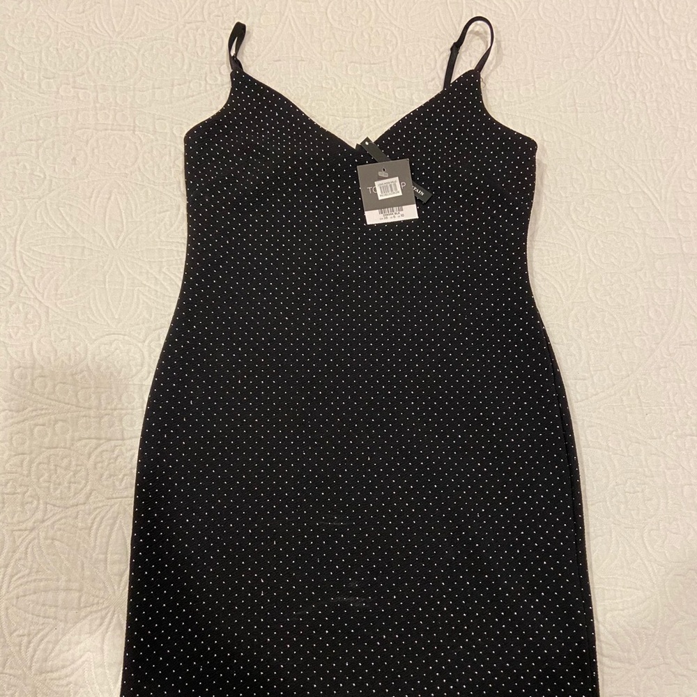 Black sequined body con dress